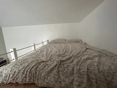 Un ou plusieurs lits dans un hébergement de l'établissement Lovely studio Crimee