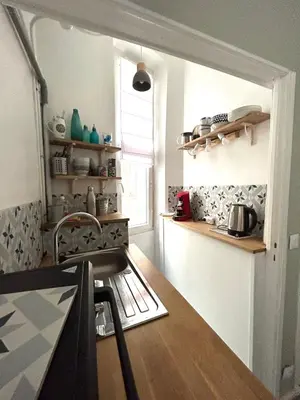 Cuisine ou kitchenette dans l'établissement Lovely studio Crimee