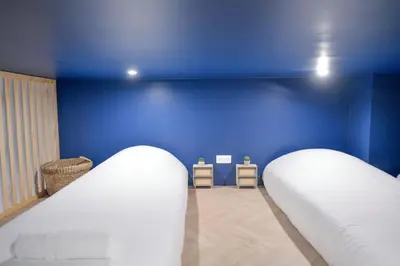 Un ou plusieurs lits dans un hébergement de l'établissement Montmartre Marvel! Designer Apartment near metro