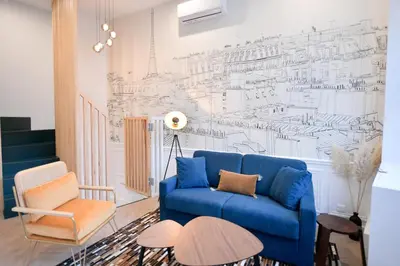 Coin salon dans l'établissement Montmartre Marvel! Designer Apartment near metro