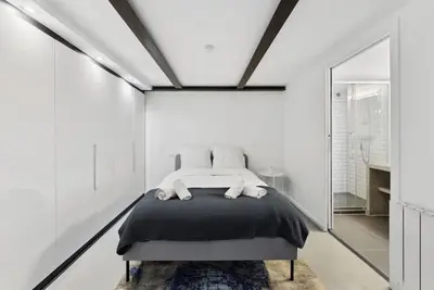 Un ou plusieurs lits dans un hébergement de l'établissement Montmartre Theater Loft
