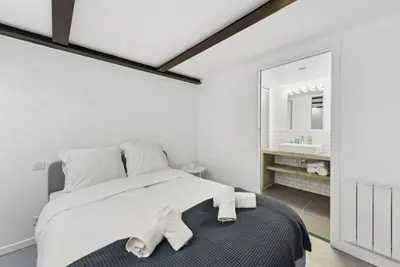 Un ou plusieurs lits dans un hébergement de l'établissement Montmartre Theater Loft