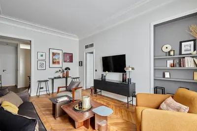 Télévision ou salle de divertissement dans l'établissement Residense Notre Dame de Paris by Studio prestige