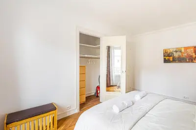 Un ou plusieurs lits dans un hébergement de l'établissement GuestReady -Superbe Appartement dans le 14ème Arr.