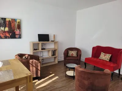 Télévision ou salle de divertissement dans l'établissement GuestReady -Superbe Appartement dans le 14ème Arr.