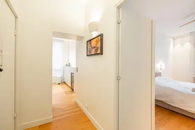 Un ou plusieurs lits dans un hébergement de l'établissement GuestReady - Appartement moderne et sophistiqué