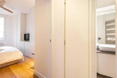 Un ou plusieurs lits dans un hébergement de l'établissement GuestReady - Appartement moderne et sophistiqué