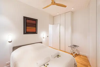 Un ou plusieurs lits dans un hébergement de l'établissement GuestReady - Appartement moderne et sophistiqué