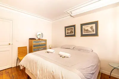 Un ou plusieurs lits dans un hébergement de l'établissement GuestReady - Superb Appt près du Pathéon