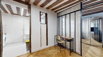 Télévision ou salle de divertissement dans l'établissement 323 Suite Louis - Superbe Appartement à Paris