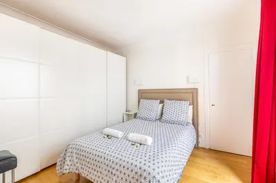 Un ou plusieurs lits dans un hébergement de l'établissement GuestReady - Appartement Élégant dans Le Marais