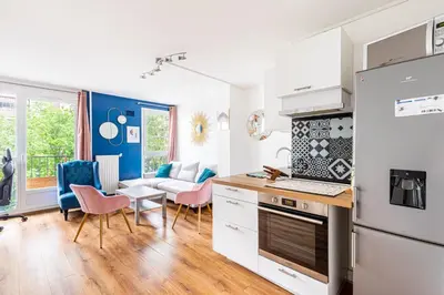 Cuisine ou kitchenette dans l'établissement GuestReady - Chic Apt Near Passerelle Bichat
