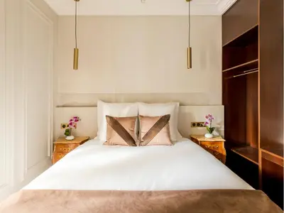 Un ou plusieurs lits dans un hébergement de l'établissement Merveil - Luxury Suite - Louvre - Ours II