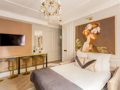 Télévision ou salle de divertissement dans l'établissement Merveil - Luxury Suite - Louvre - Ours II
