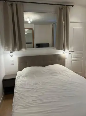 Un ou plusieurs lits dans un hébergement de l'établissement Luxury Appartment, Champs Elysées, Neuf !