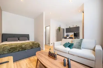 Coin salon dans l'établissement Renovated Studio walking distance to Paris