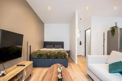 Un ou plusieurs lits dans un hébergement de l'établissement Renovated Studio walking distance to Paris
