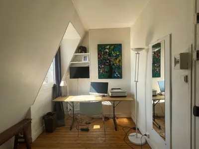 Télévision ou salle de divertissement dans l'établissement Superbe appartement de 120m2 en plein Paris