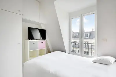 Un ou plusieurs lits dans un hébergement de l'établissement INVALIDES - TOUR EIFFEL