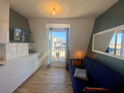 Télévision ou salle de divertissement dans l'établissement STUDIO PARIS VUE IMPRENABLE