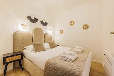 Un ou plusieurs lits dans un hébergement de l'établissement Modern apartment - 2BR-6P - République