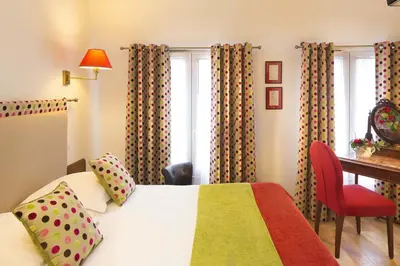 Un ou plusieurs lits dans un hébergement de l'établissement New Orient Hotel