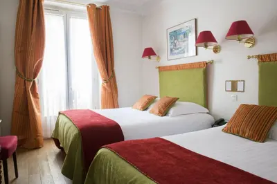Un ou plusieurs lits dans un hébergement de l'établissement New Orient Hotel