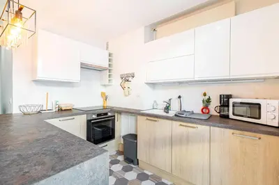 Cuisine ou kitchenette dans l'établissement GuestReady - Appartement baigné de lumière