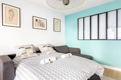Un ou plusieurs lits dans un hébergement de l'établissement GuestReady - Appartement baigné de lumière