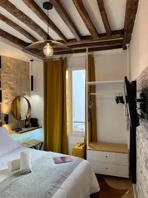Un ou plusieurs lits dans un hébergement de l'établissement Studios Pasteur- Paris XVe