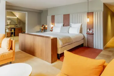 Un ou plusieurs lits dans un hébergement de l'établissement Hôtel Pilgrim