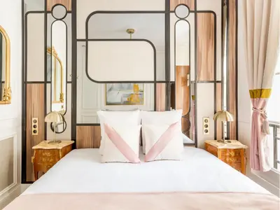 Un ou plusieurs lits dans un hébergement de l'établissement Merveil - Luxury Suite - Champs Elysees - Mauroy I