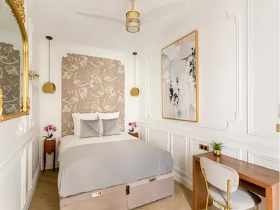 Un ou plusieurs lits dans un hébergement de l'établissement Merveil - Luxury Suite - Champs Elysees - Mauroy I