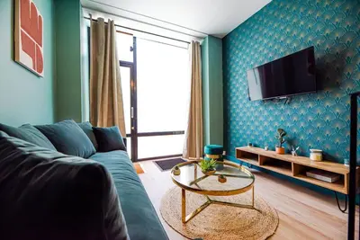 Télévision ou salle de divertissement dans l'établissement Beautiful Apartment close to Eiffel Tower
