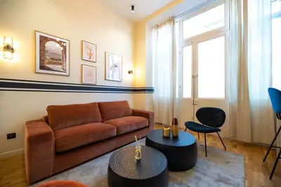 Coin salon dans l'établissement Lovely flat in eiffel tower area