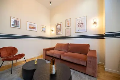 Coin salon dans l'établissement Lovely flat in eiffel tower area