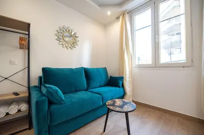 Coin salon dans l'établissement Cosy apartment in Paris