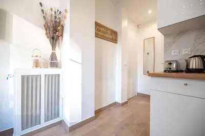 Cuisine ou kitchenette dans l'établissement Cosy apartment in Paris