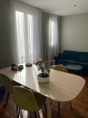 Coin salon dans l'établissement Les Appartements du Grand Hôtel Clichy Paris