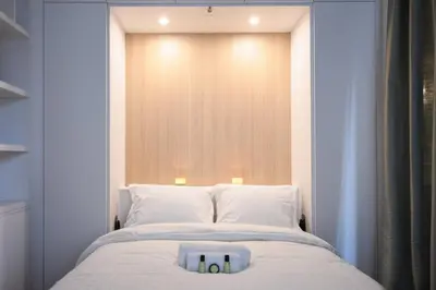 Un ou plusieurs lits dans un hébergement de l'établissement GuestReady - Apt de luxe Proche de la Tour Eiffel
