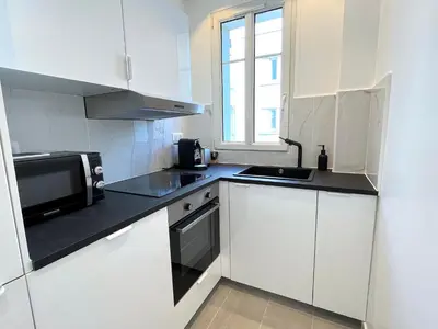 Cuisine ou kitchenette dans l'établissement L'appartement Edouard