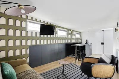 Coin salon dans l'établissement Pick A Flat's Apartements in Louvre-Rivoli - Rue du Roule