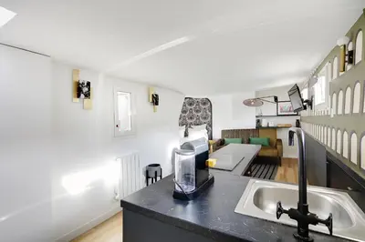 Cuisine ou kitchenette dans l'établissement Pick A Flat's Apartements in Louvre-Rivoli - Rue du Roule