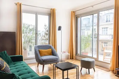 Coin salon dans l'établissement Superbe appartement au coeur de Paris