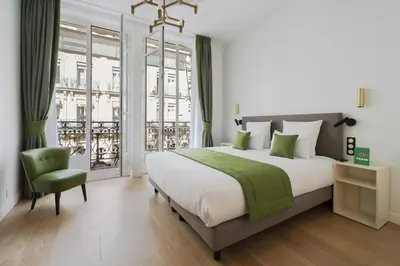 Un ou plusieurs lits dans un hébergement de l'établissement Vestay Montaigne