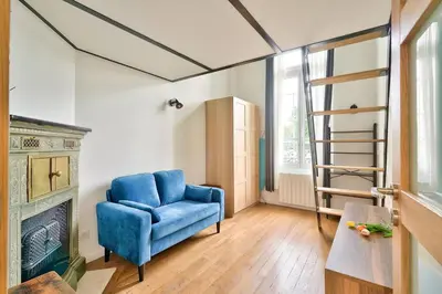 Coin salon dans l'établissement GuestReady - Bel appartement près du zoo de Paris