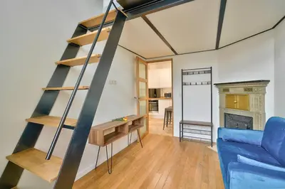 Coin salon dans l'établissement GuestReady - Bel appartement près du zoo de Paris