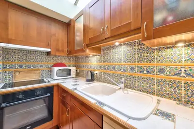 Cuisine ou kitchenette dans l'établissement GuestReady - Bel apt près de l'Arc de Triomphe