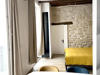Coin salon dans l'établissement MARAIS Appartement 2 Chambres 2 Salles de bain - SPA JACUZZI !