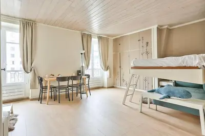 Un ou plusieurs lits dans un hébergement de l'établissement GuestReady - Lovely Minimalist Studio in Plaisance